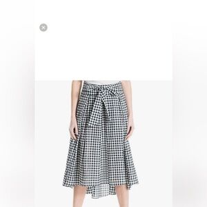 plaid skirt status
